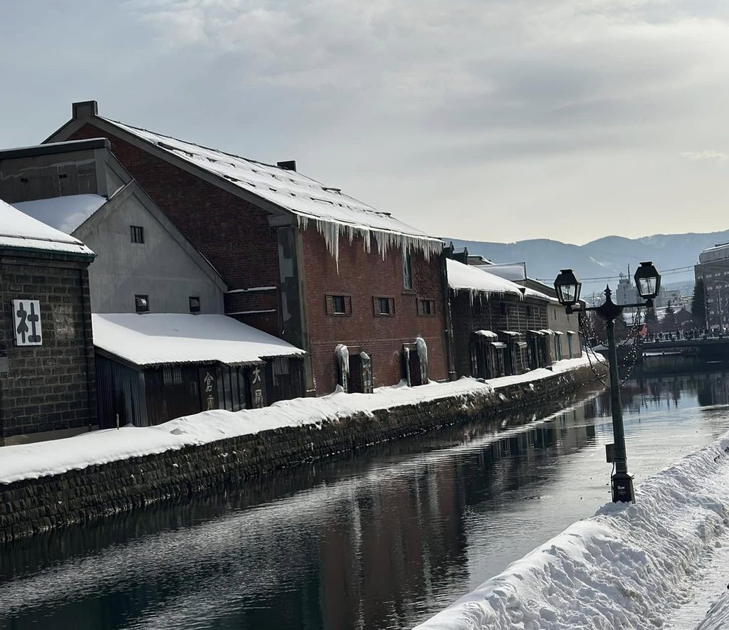 Snow-covered Otaru Canal and historic warehouses in Hokkaido, Japan